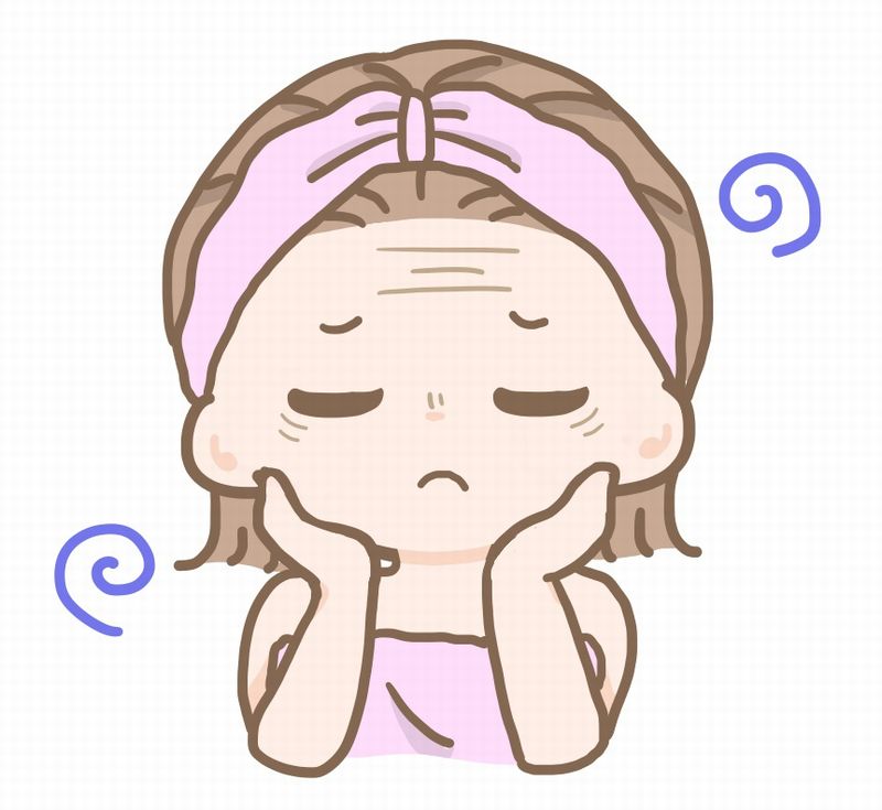 小じわのお手入れをする女性